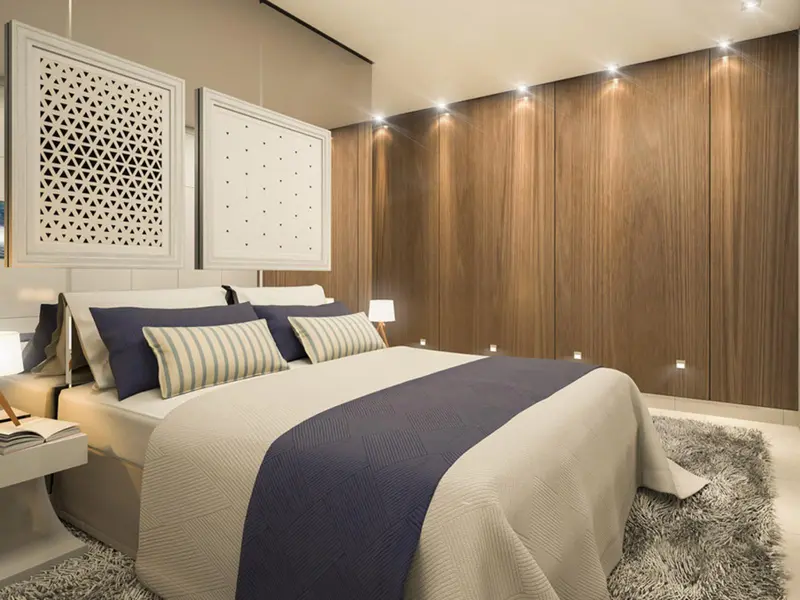 Suíte de casal com painel de madeira do Follow Bueno Residence, Setor Bueno em Goiânia (imagem de projeto)