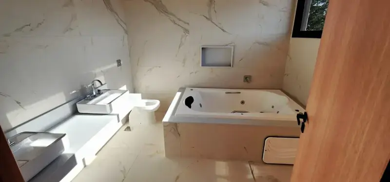 Ambiente interno do sobrado no Jardins França, Goiânia