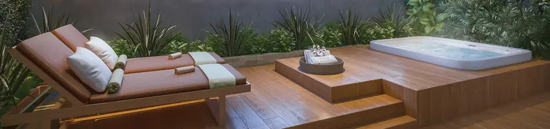 Deck com espreguiçadeira e spa privativo em apartamento de alto padrão