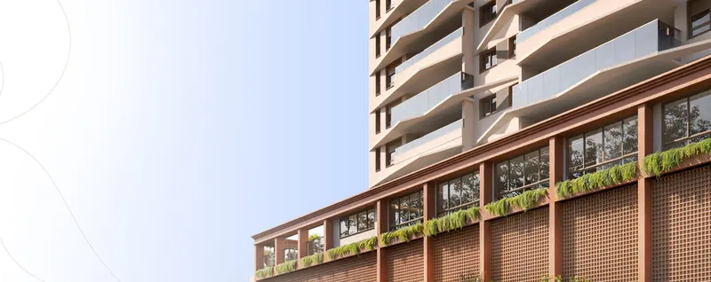 Fachada de prédio residencial com jardineiras verdes em Goiânia